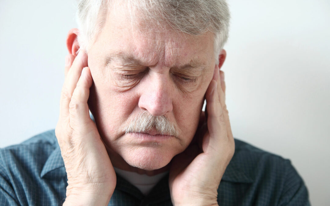Patient ressentant un mal de tête ou une migraine