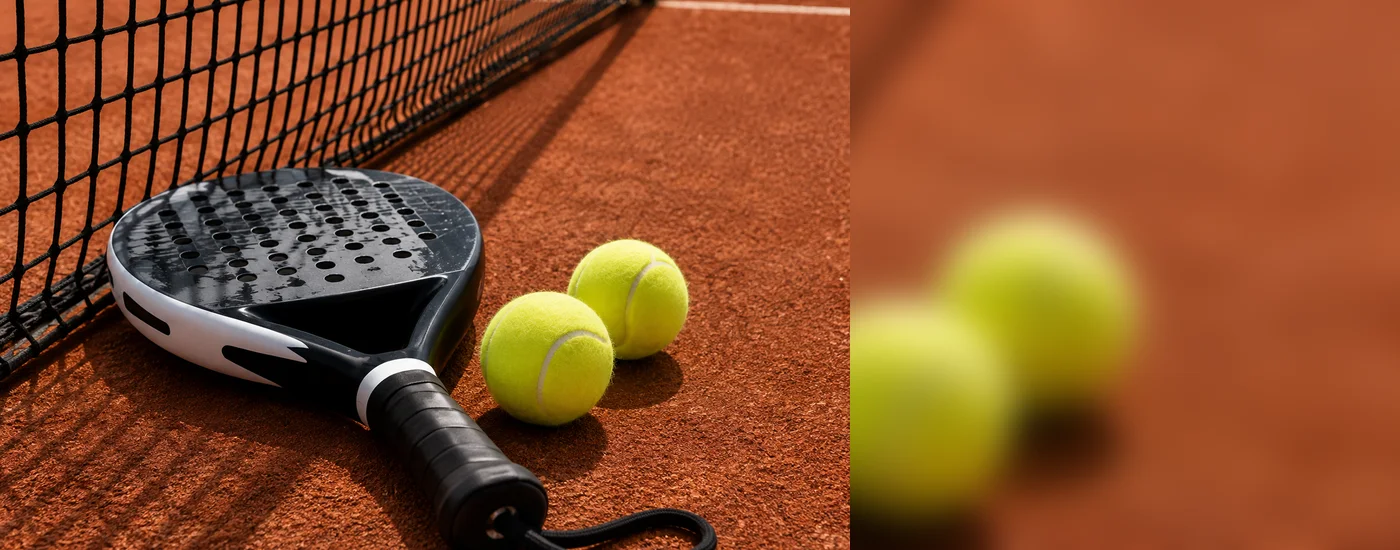 Raquette et balles de padel-tennis sur un terrain à Gland
